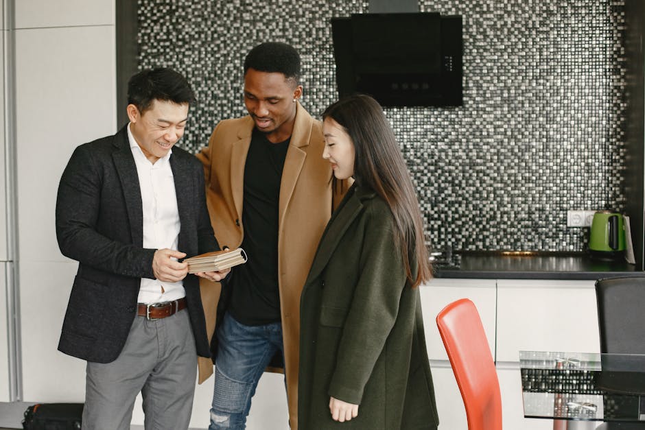 A diverse group of professionals collaborating in a bright, modern office.